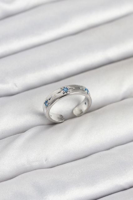 Clariss BYK3897-BLNC Pirinç Gümüş Renk Mavi Zirkon Taşlı Kutup Yıldızı Model Kadın Yüzük Çok Renkli