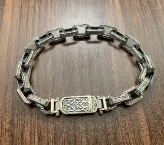 El yapımı 925 ayar gümüş, ağır, çok sıralı dokuma bileklik, 37 gram.