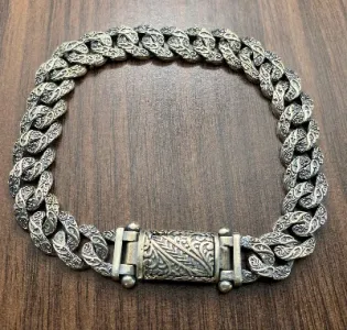 El yapımı 925 ayar gümüş, ağır, çok sıralı dokuma bileklik, 38 gram.