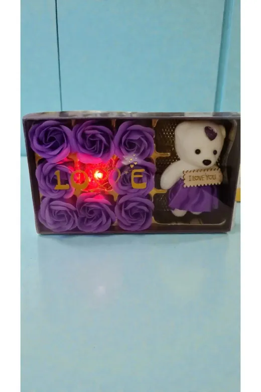FAMEMUS ACCESSORY 2ewewqewqeqe Sevgililer Gününe Özel(I Love You Yazılı Asetatlı Güllü Ayıcık Mor Renk Hediyelik Boyut:20*11Cm